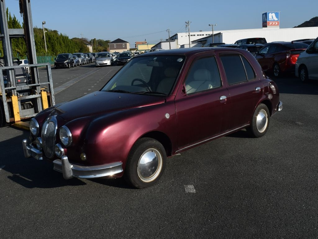 Mitsuoka значок